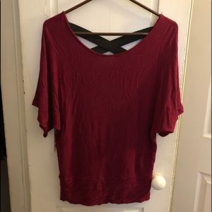 Maroon flowy top with open cross back